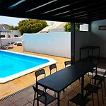 With Heated Pool