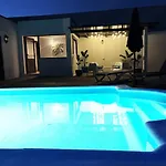 With Heated Pool